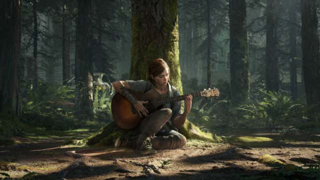 Ellie is sitting under a tree playing her guitar. 
